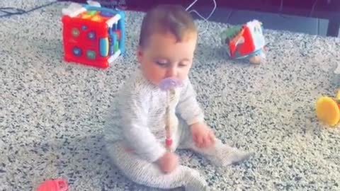 baby gets scared with her mother, very cute