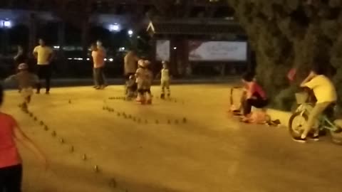 park roller skating kid