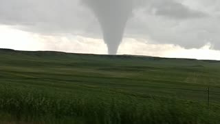 Storm Chasers Catch Tornado Touchdown