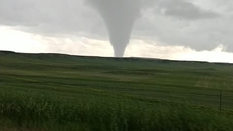 Storm Chasers Catch Tornado Touchdown