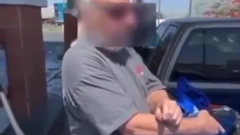Couple confronting a guy filling the back of his pickup truck
