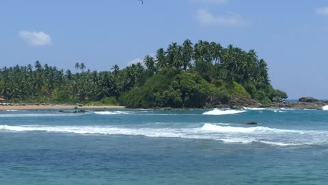 Waves arriving at a tropical beach