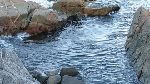 Waves Crashing on Rocks