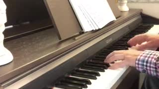 "O Come, O Come Emmanuel" -- Kendall Straight on the piano