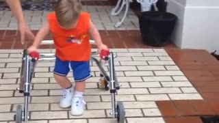 Boy with Down Syndrome takes his first steps