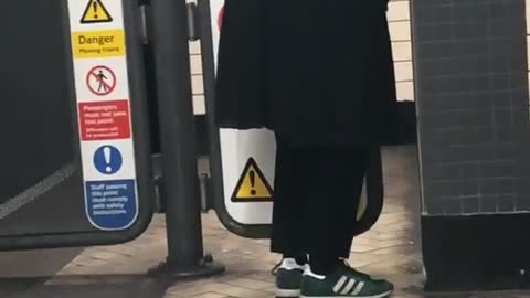 Man pees inside subway station