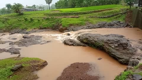 "River'' water that flows downhill from the force of gravity.