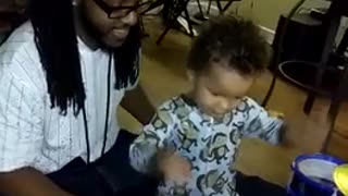 Toddler Learning The Drums Hits Dad In The Face With Drum Stick