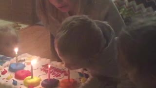 Little Boy Eats Fire Off Cake