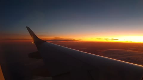 Beautiful View of 🌅 Sunrise from Airplane Left Wing window