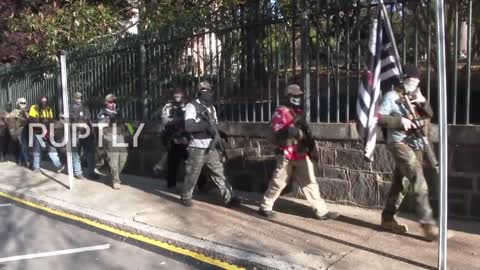 Militia Members Defy New Local Gun Laws with Armed March in Richmond