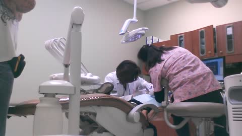 Boy gets his first needle ever at the dentist.