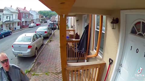 Funy A cop covering camera before knocking the door. (Cute Video)