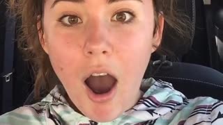Girl in blue jacket ponytail allergic reaction on face