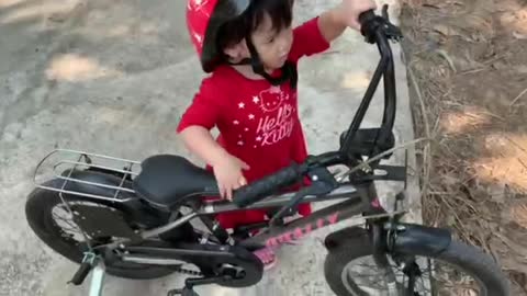 Julie want to try bike by herself