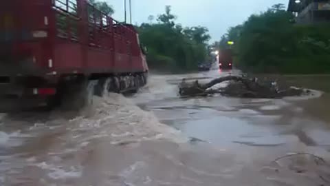 truck trying to cross flooded river bud failed