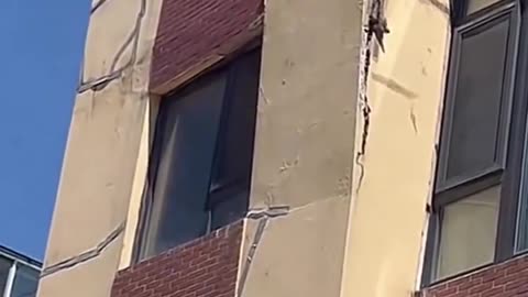 Building facades in China, falling down on their own.