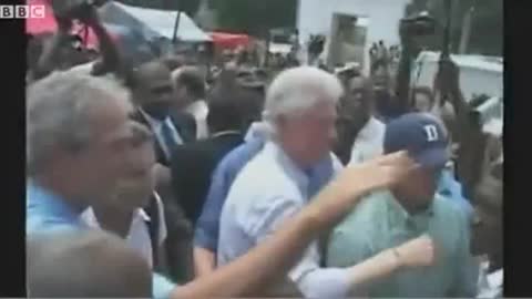 Featured 03/31/2010: Bush Wipes The Haitian Off On Clinton