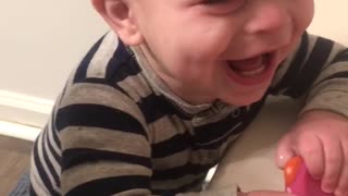 Baby Laughs At Rubber Ducky