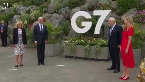 Johnson and Biden bump elbows at G7