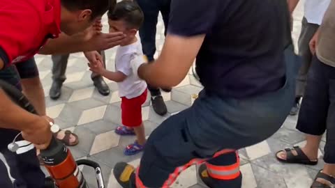 Rescue Team Manages to Free a child Trapped Between an electronic Door and a wall