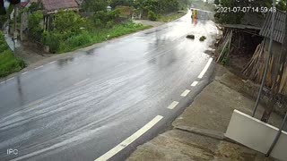 Speeding Truck Tips Over on Slippery Road