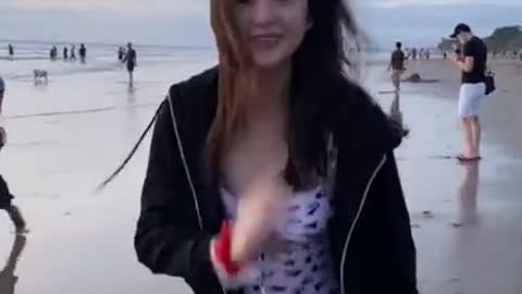 Beautiful girl dance at the sea.