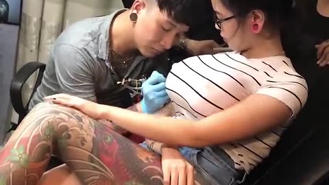 BUSTY GIRL GETTING TATTOO PRANK