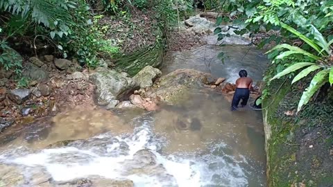 Build a swimming pool at a waterfall by wild people and their daily life