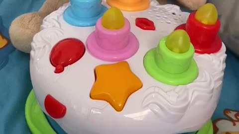 Baby play birthday cake with teddy bear toys , very funny
