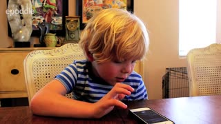 Five-Year-Old Boy Tries To Have Conversation With Siri