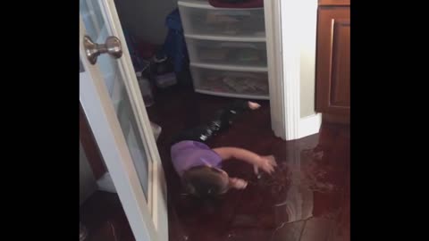 Baby Creates Her Own Indoor Slip And Slide