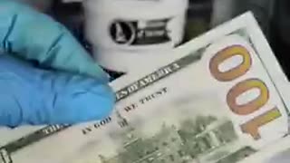 Microscopic Images in a $100 Bill Found!