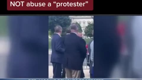 Congressman Higgins removing a protester