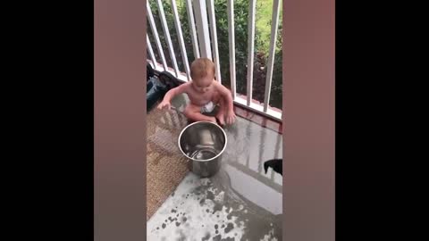 Lovely baby and funny puppy