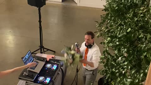 DJ Catches Bride's Bouquet Twice