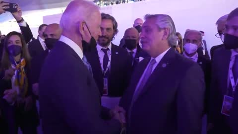 Joe Biden Pulls Down Mask To Get Close And Talk To Argentinian President