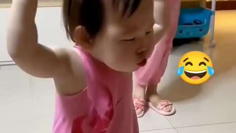 Cute baby enjoy dance.