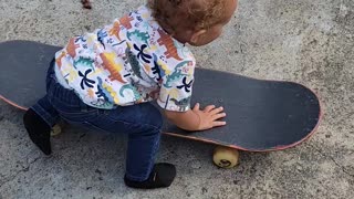 1-Year-Old Skateboarding Baby