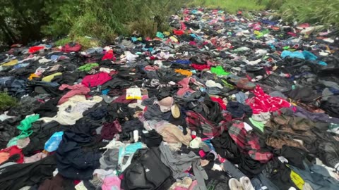 "The Mattress" illegals toss clothing /trash/PASSPORTS before boarding buses