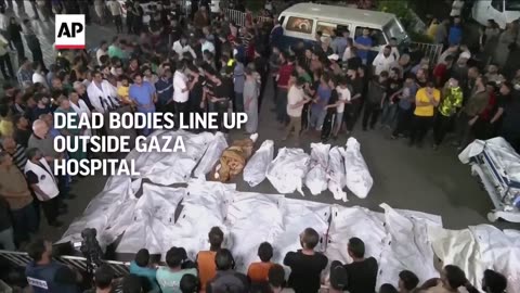 Bodies line up outside Gaza hospital as Israeli airstrikes continue