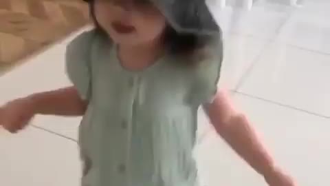 Cute Little girl trying to singing