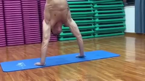Muscle boy, hand stand