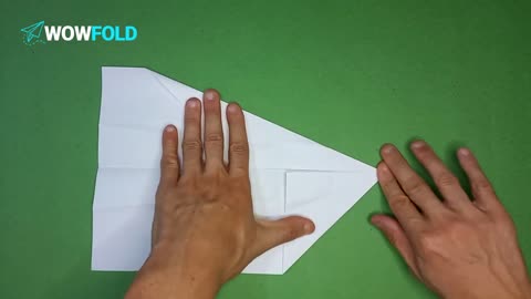Little One - folding a paper airplane