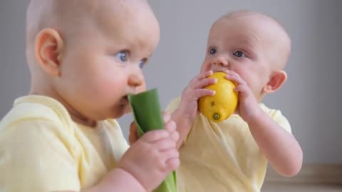 Two Baby eats food tasting food qulity