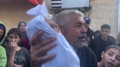 grandfather says his grandson was killed by Israeli Airstrikes( he lied its a doll)