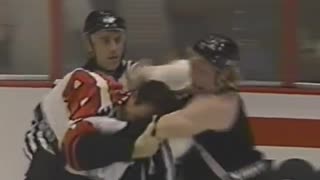 Eric Lindros (Philadelphia) Fights Marty McSorley (Los Angeles)