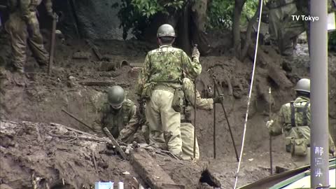 Japan's landslide rescue, with about 80 missing