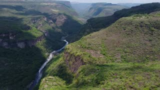 nature videos status from drone flying across mountains and rivers