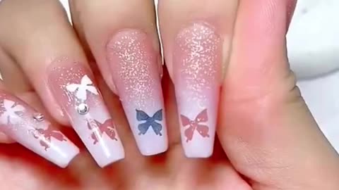 "Fluttering Elegance: Pink, White, and Glitter Butterfly Nail Art Tutorial"